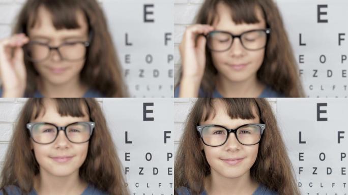 近视的小女孩戴上眼镜。