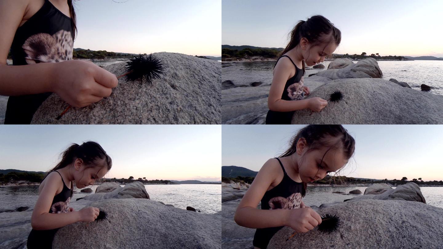 海边玩耍的小女孩海边海胆玩耍外国小孩