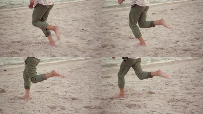 沙滩上奔跑的男子三亚厦门青岛风景海南海岛