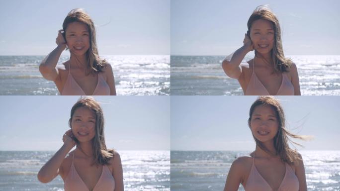 比基尼年轻女性肖像在海边海滩