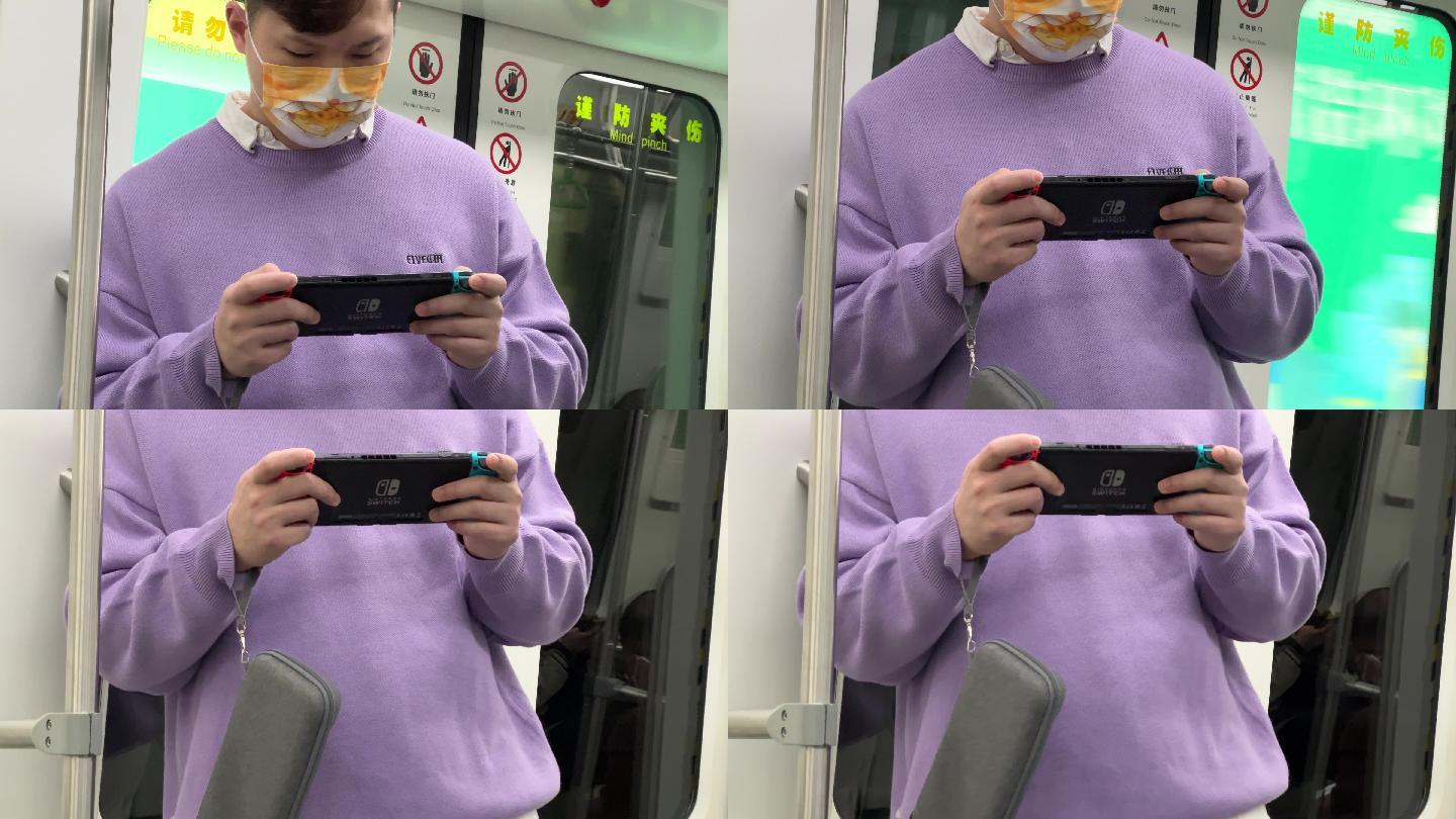 地铁车厢上玩手机游戏的男人特写镜头