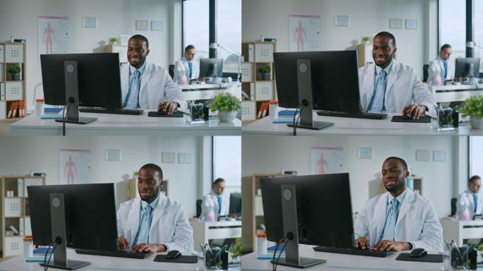 医生正在一家健康诊所的电脑上工作
