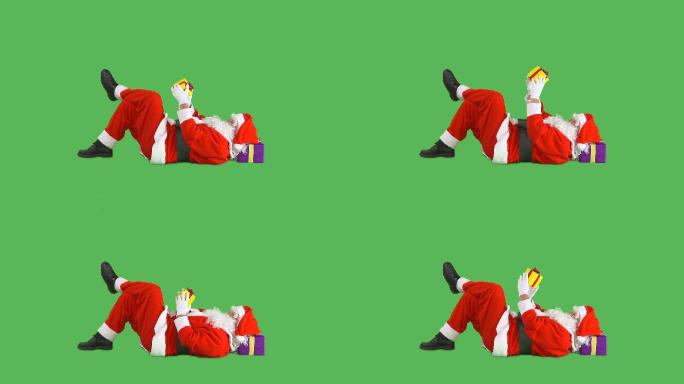 圣诞老人睡在绿屏上