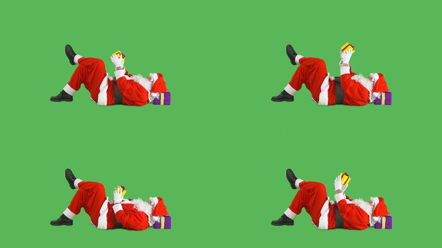 圣诞老人睡在绿屏上