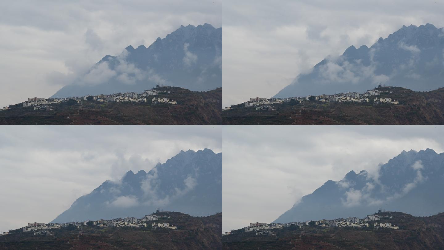 大山中的村庄天边云雾延时摄影素材