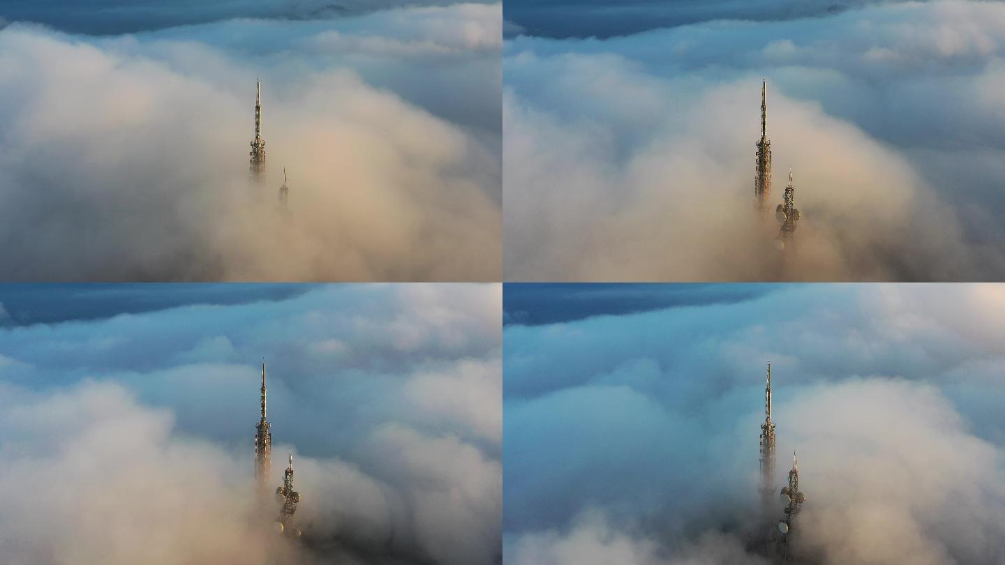 航拍山顶云雾中的信号塔