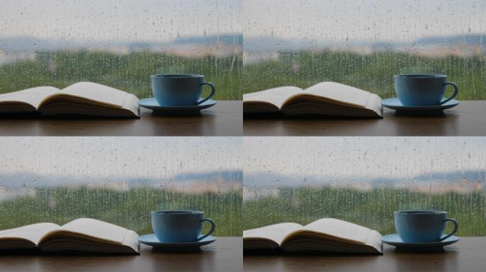 雨天桌上放着一杯咖啡和一本书