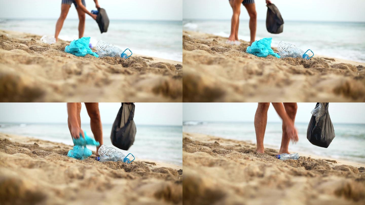 海边清理垃圾的人海洋污染环境保护塑料垃圾
