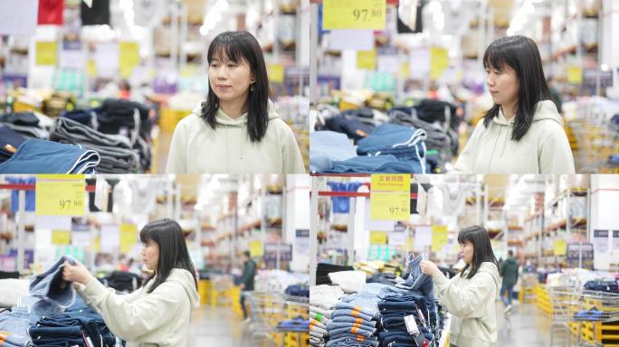 年轻女性在超市里选购货物衣服
