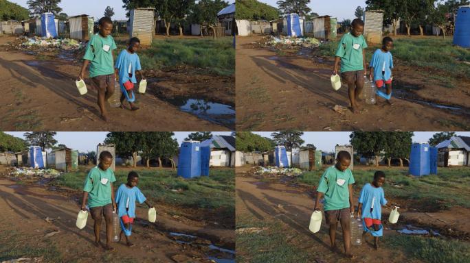 水危机。非洲贫民黑人小孩衣服破烂