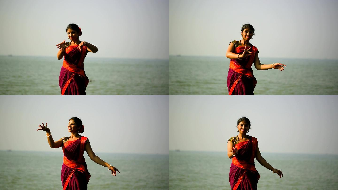 印度古典舞者早上在海滩边练习