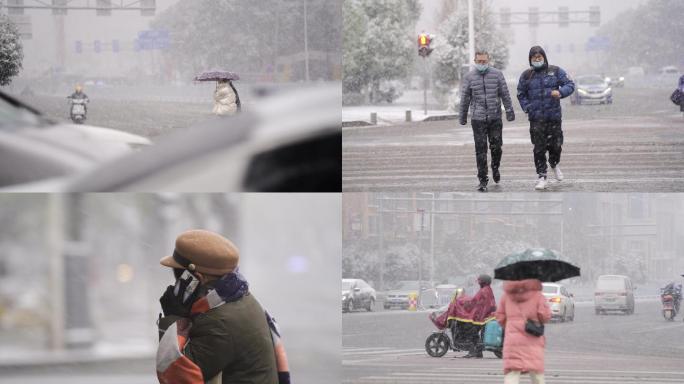 下雪路口上的行人