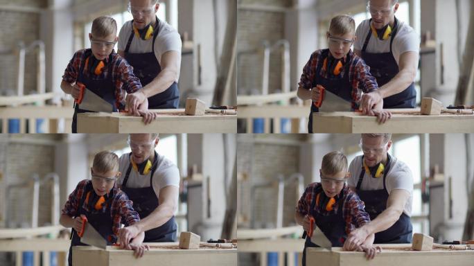 木匠教儿子如何用手锯切割木板的中镜头