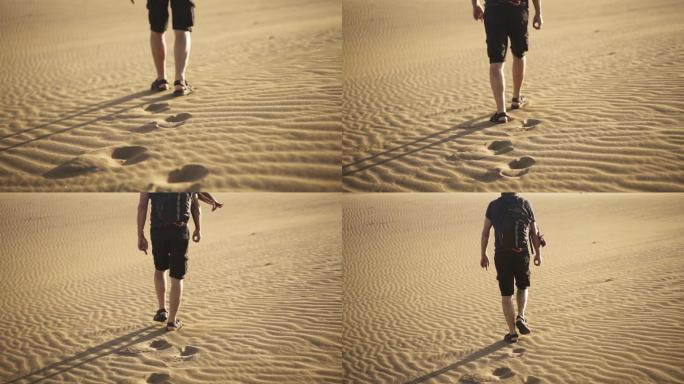 背着背包在沙漠中行走的男人