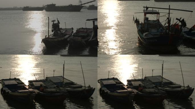 夕阳下泉州渔港码头船只停靠