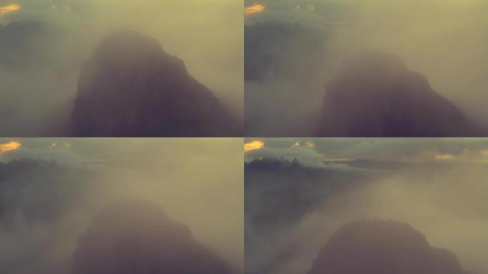 攀登高峰观云海日出的航拍素材