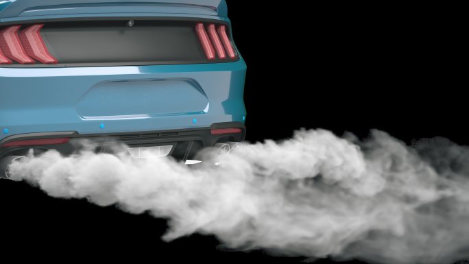烟从跑车的排气管冒出来
