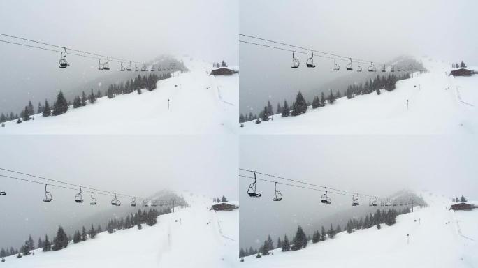 空空的缆车索道冬天飘雪雪中风景风光美景