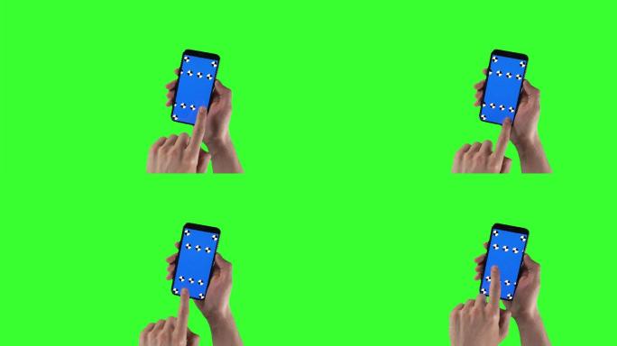男子在绿屏上触摸蓝屏手机