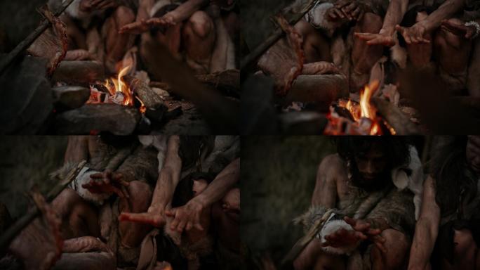 史前时代人类在篝火旁取暖