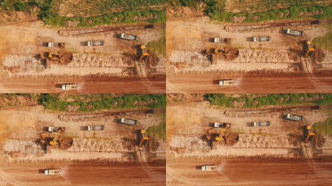 挖掘机作业航拍土方作业防尘洒水车