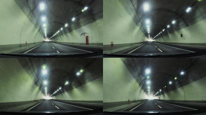 驾车穿越隧道白光转场公路行驶第一视角