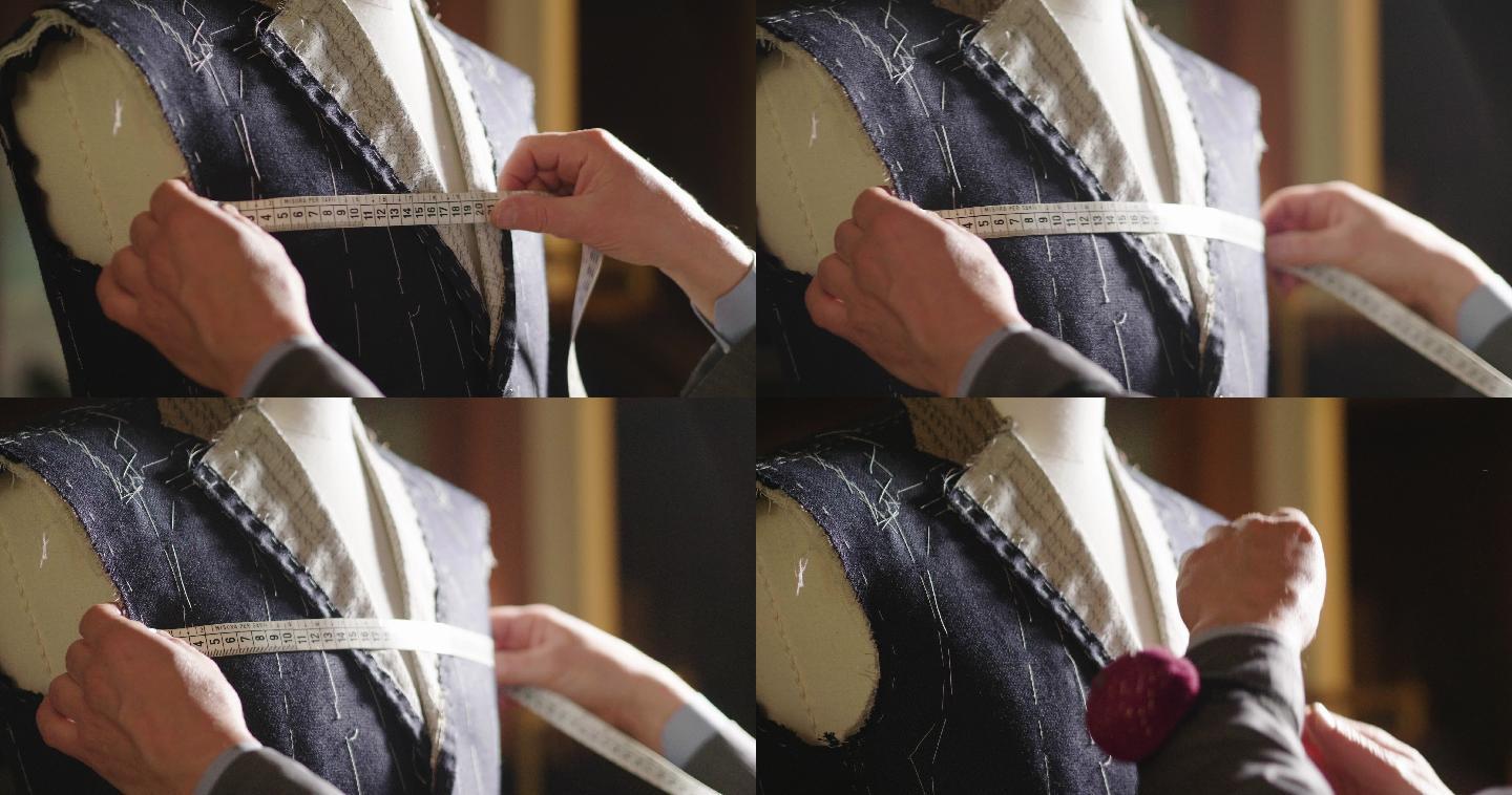 按照裁缝的传统裁剪布料的裁缝。