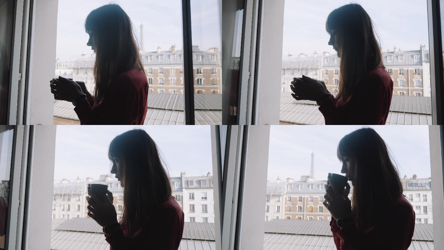 女子在窗前喝咖啡外国人女士窗边