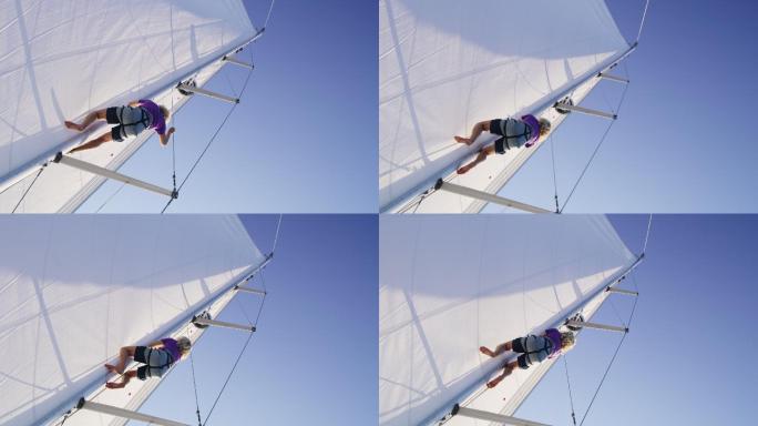 男子爬上桅杆轮船邮轮帆船旅游极限运动