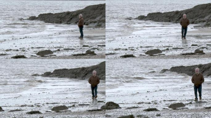 海滩上的老人孤独年迈老头子