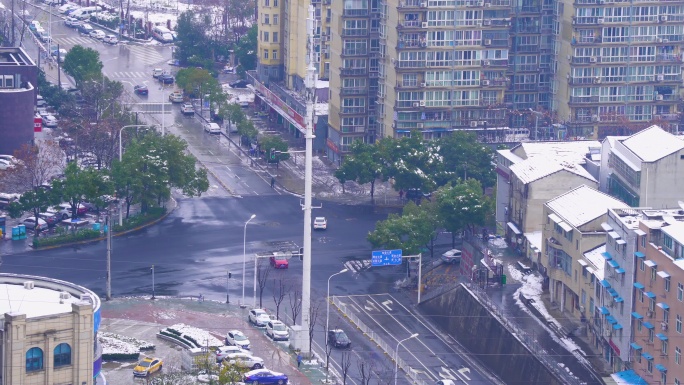 4K十字路车流雪中街景