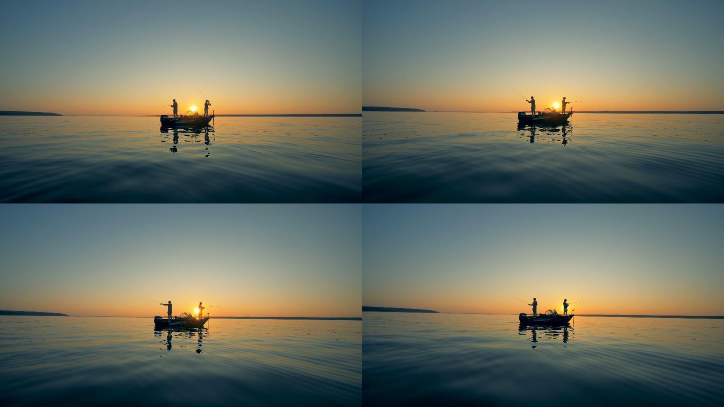 日出时在摩托艇上钓鱼时的男性侧影