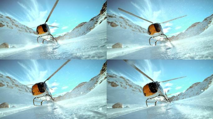 直升机降落在冰雪覆盖的山上