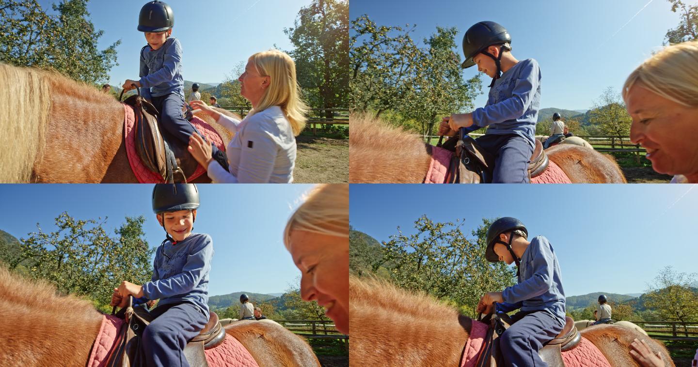 骑马的小男孩上马玩耍