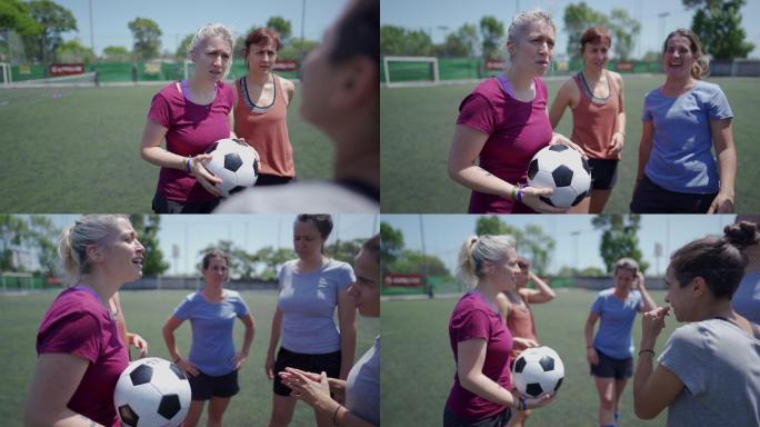 一群女足球运动员在比赛开始前谈论战术