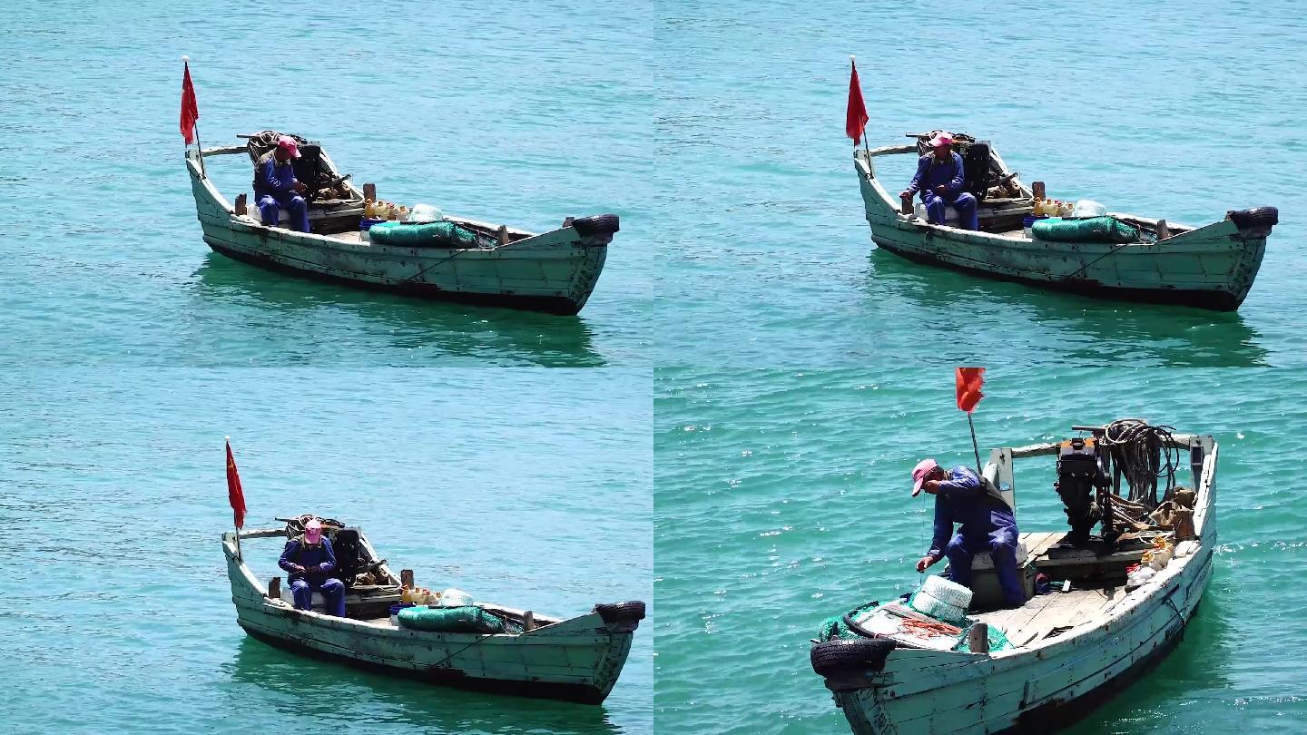 一艘插着国旗的钓鱼小船