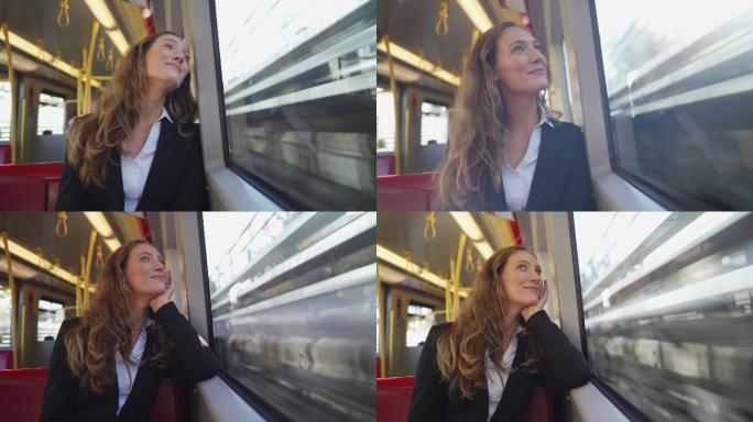 坐火车旅行的女人开心的女人旅途中的女孩喜