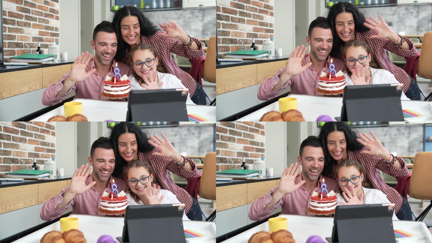 家人和小女孩在视频通话时庆祝生日