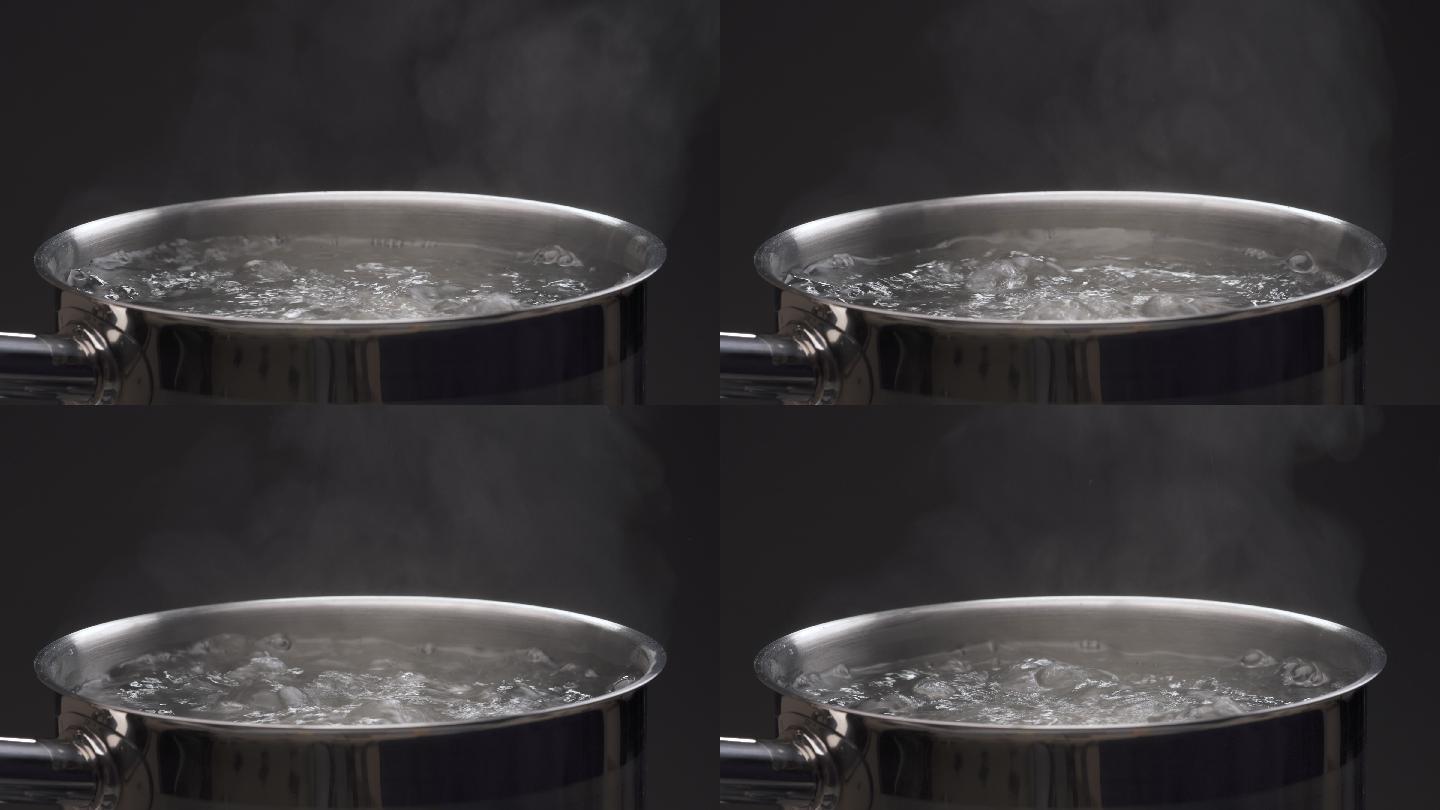 锅里煮沸的水烧热水玻璃水壶开水