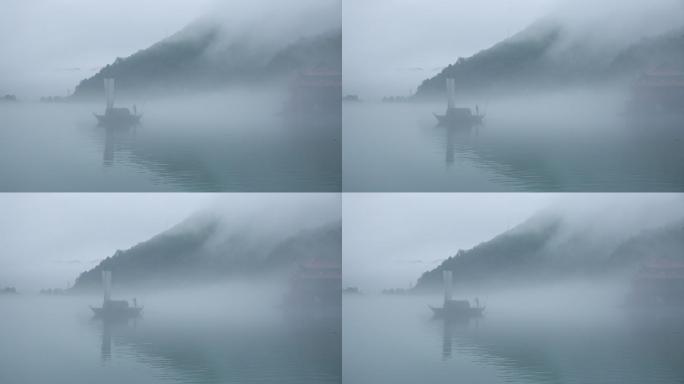 瓯江帆船在云和湖上水雾弥漫如梦如幻