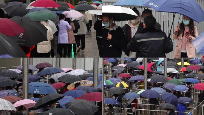 下雨天核酸检测排队场面