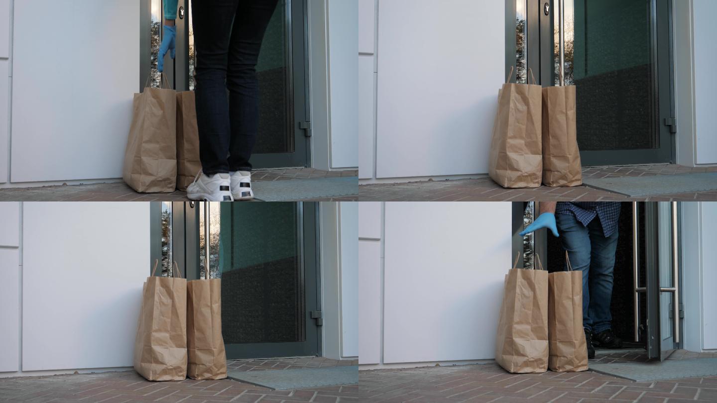 带手套的快递员将食物送到顾客家门口