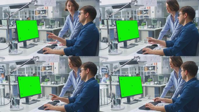 工程师使用绿色模拟屏幕台式电脑。