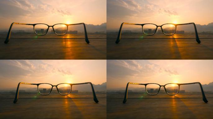 日落时桌上的眼镜