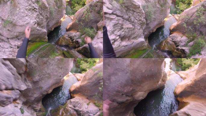 人从危险的峡谷悬崖上坠入河中