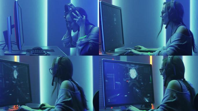 玩家女孩在她的电脑上玩游戏。