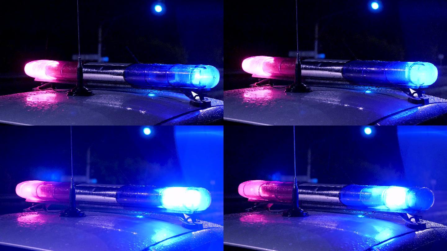 警车在犯罪现场闪烁着红蓝灯