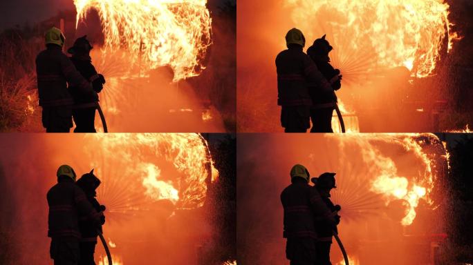消防员喷水灭火中国消防扑灭大火消防安全
