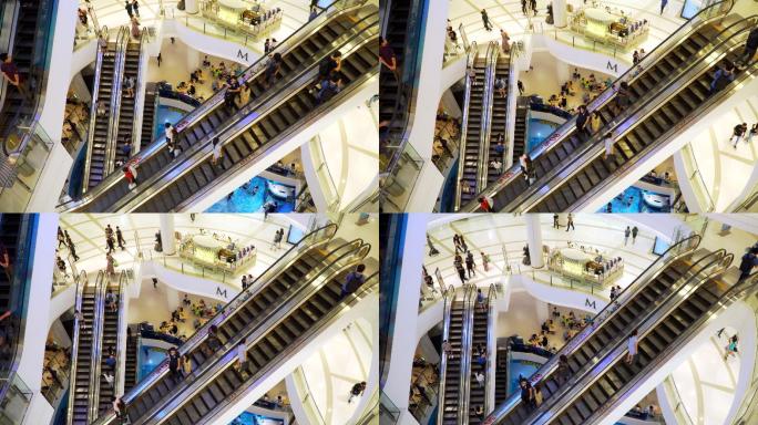曼谷购物中心乘坐自动扶梯的人们