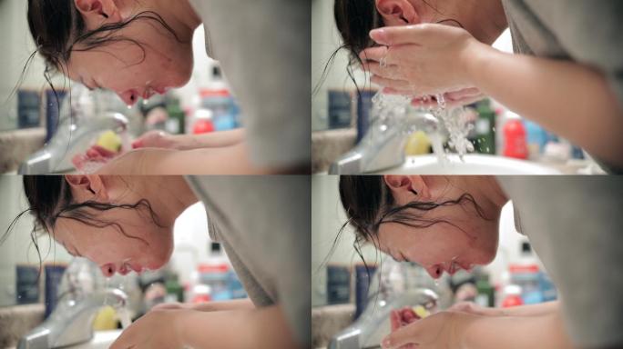 年轻女子洗脸洗脸清洁护肤
